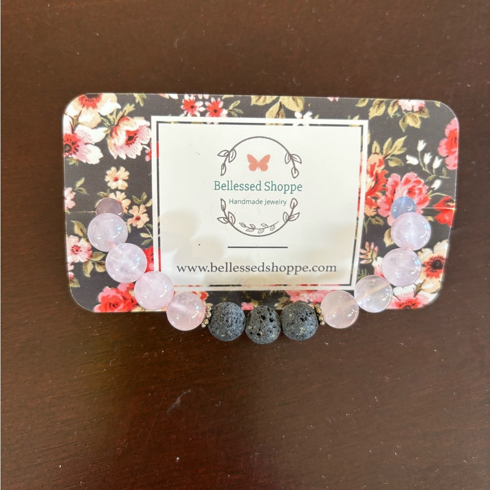 Pink beaded bracelet with lava beads. Can be used with Essential oils.  Nwt